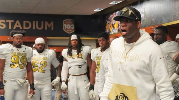 Deion Sanders talking to Colorado players in locker room at Rose Bowl